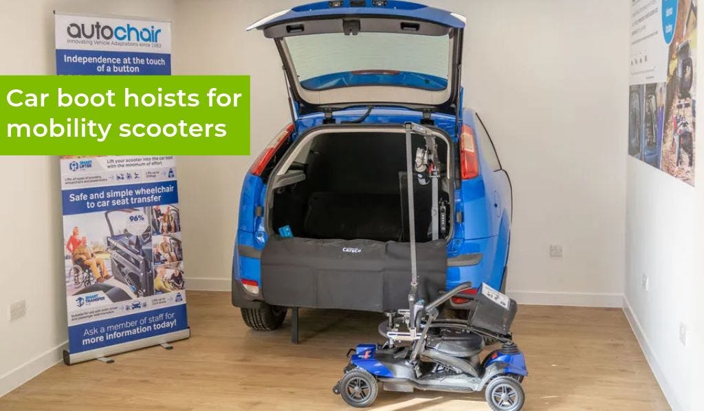 Car boot hoist listing a mobility scooter