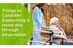 elderly amputee in wheelchair being pushed by caring relative
