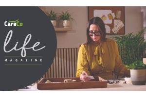Sarah Cook working on her designs