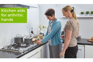 OT helping a customer with kitchen aids