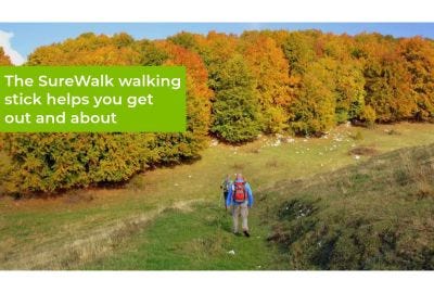people walking in the hills with aid of sticks
