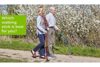 Couple strolling with walking sticks