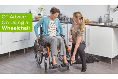 OT Natasha showing a customer how to use a wheelchair