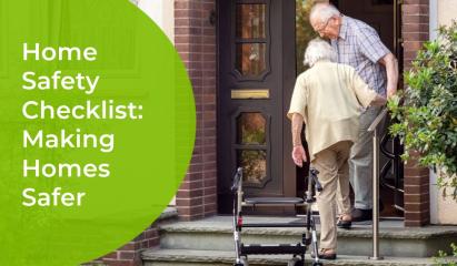 elderly couple climbing steps to their front door