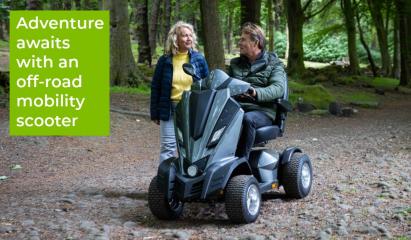 man riding an all-terrain mobility scooter in the woods