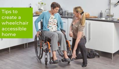 Woman in a wheelchair in her kitchen with an OT