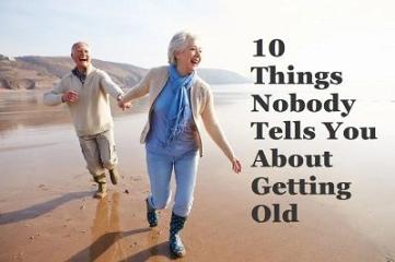 old couple running and laughing on the beach