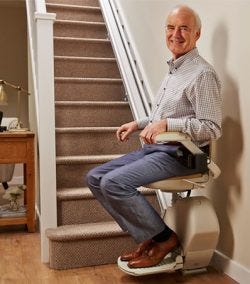 man on a stairlift