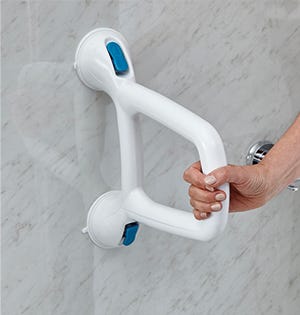 grab handle fixed to wall with woman's hand hold it