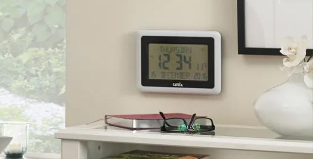 Clear Display LCD Clock Mounted on wall 