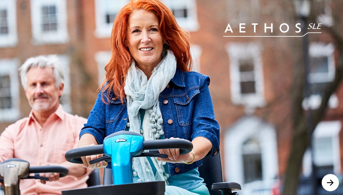 A lady walking with the Xtrail rollator