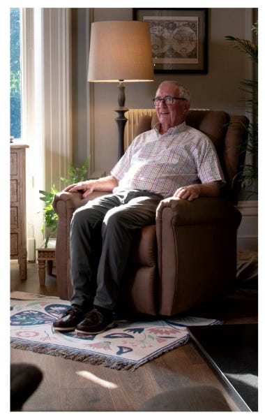 man sitting in a Luxbury riser recliner