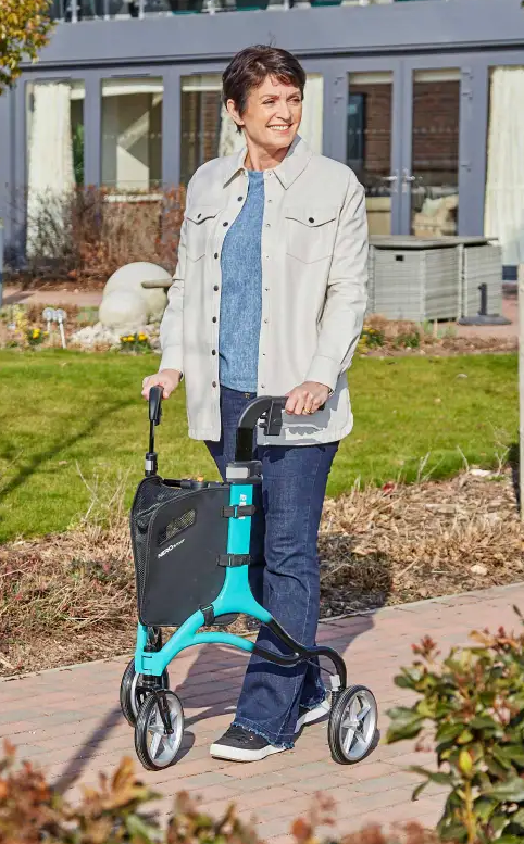 woman walking with a blue tri-walker