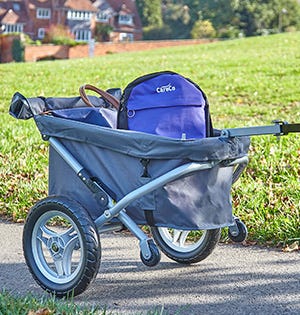 a mobility scooter trailer with bags and other luggage