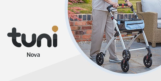 person pushing the Tuni Nova wheeled walking aim ouside